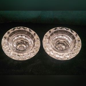 Two vintage glass candleholders
